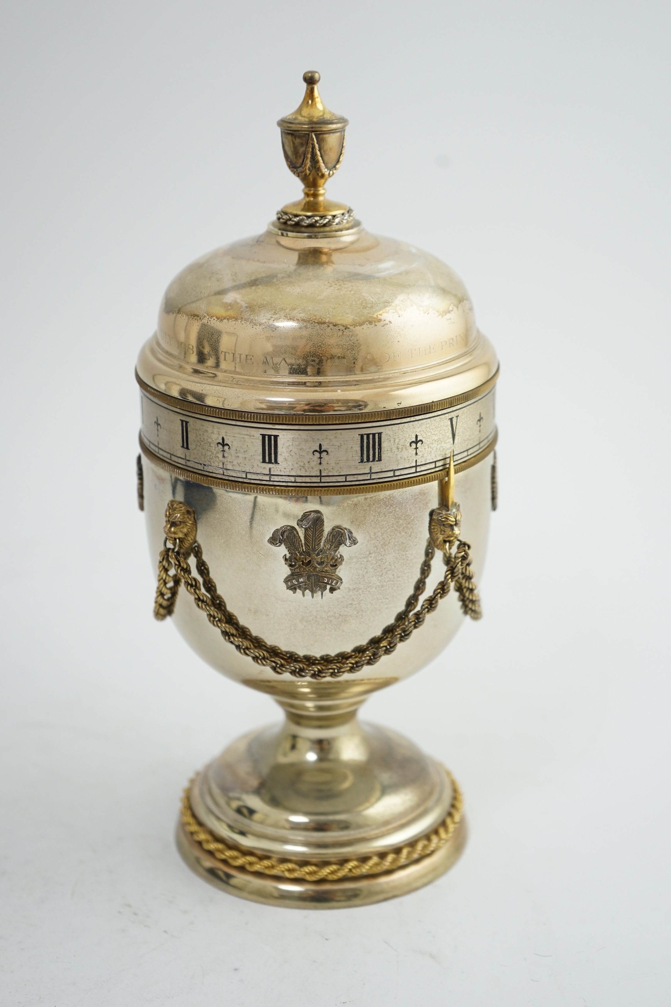 A cased Limited Edition Commemorative Prince of Wales and Lady Diana Spencer 1981 Royal Wedding 'Prince of Wales' silver eight day manual wind clock, by Mappin & Webb